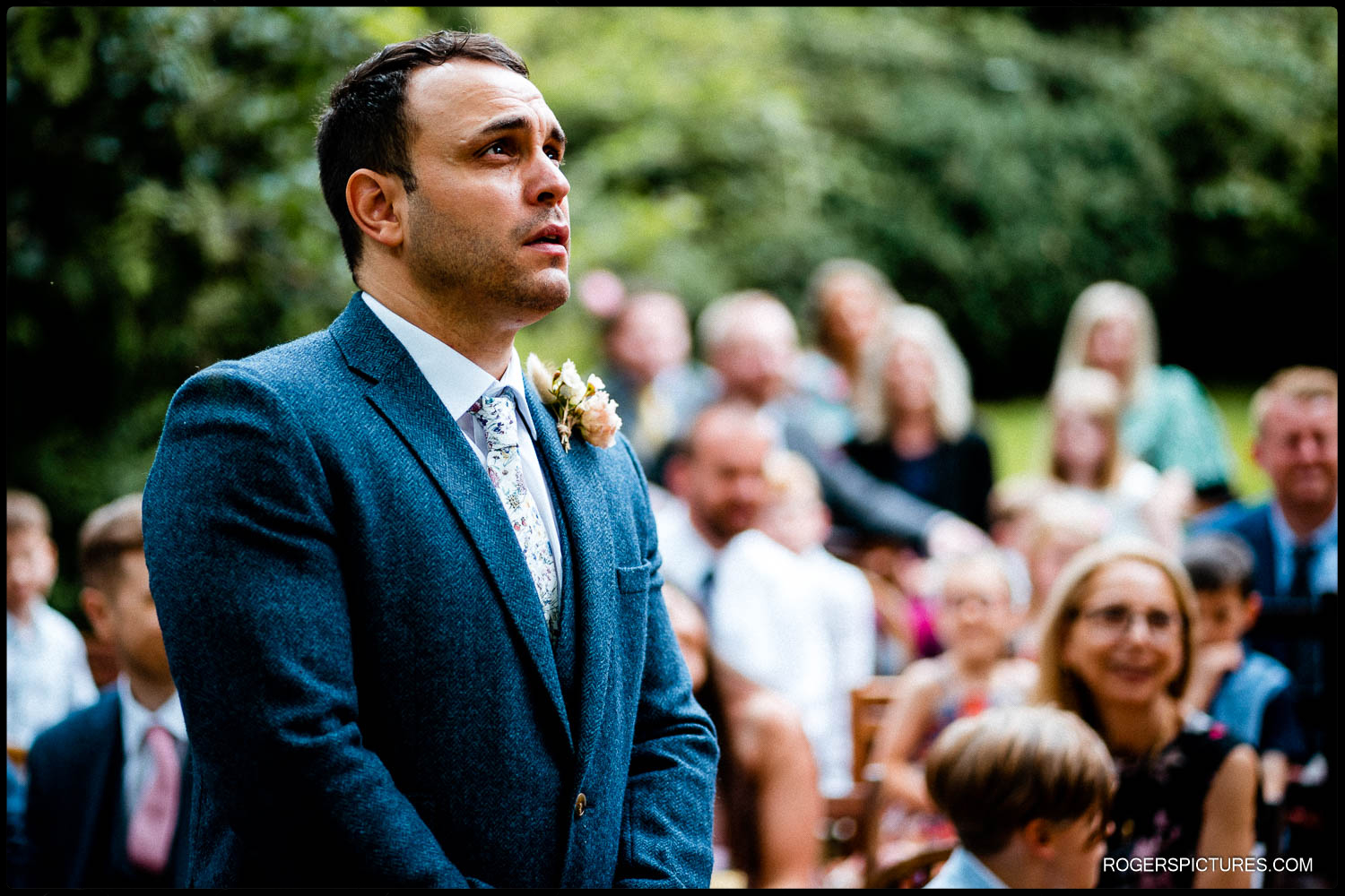 Nervous groom captured at an outdoor wedding in the UK