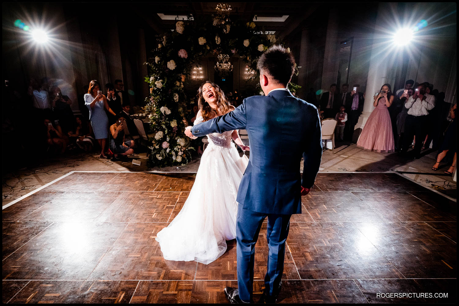 Stunning backlit photo of a couples First Dance at a London wedding