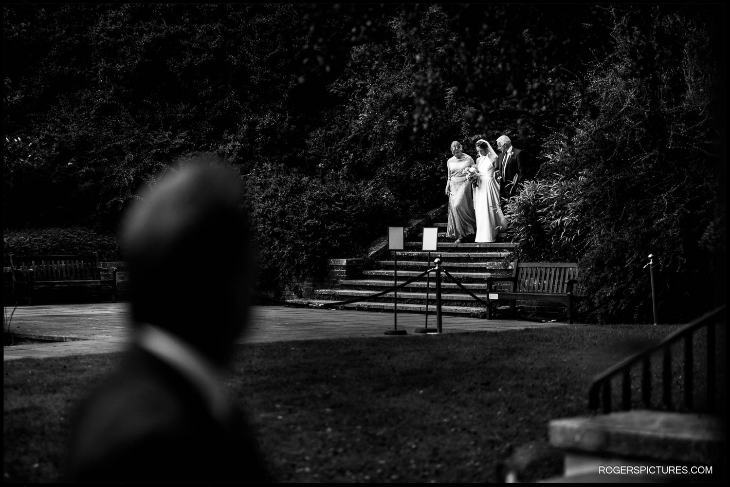Black and white documentary wedding photo at an outdoor wedding in Hampstead