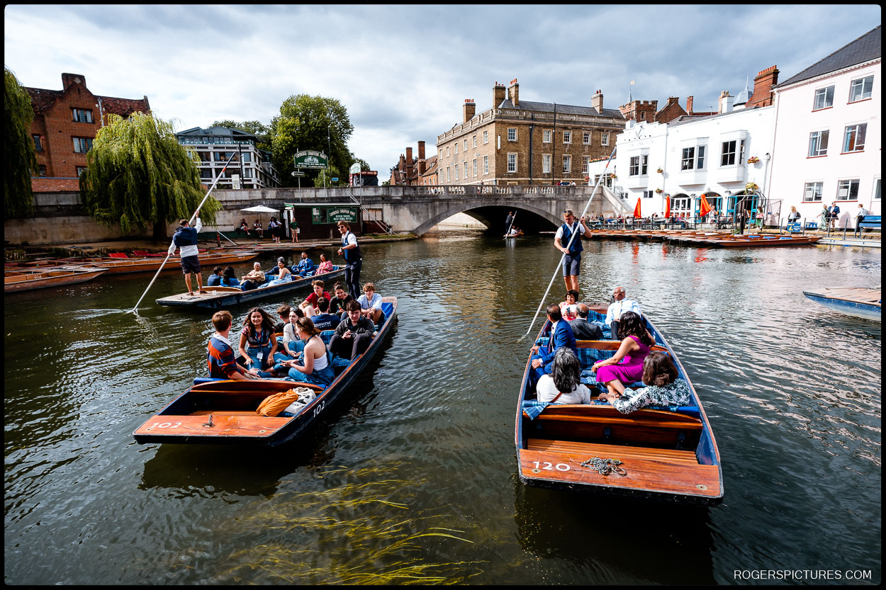 Wedding party in punts on the River Cam Cambridge