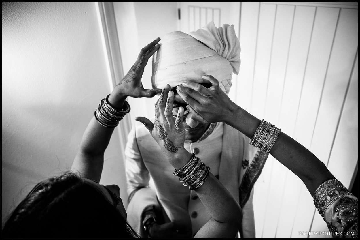Groom getting ready for Indian wedding in Essex