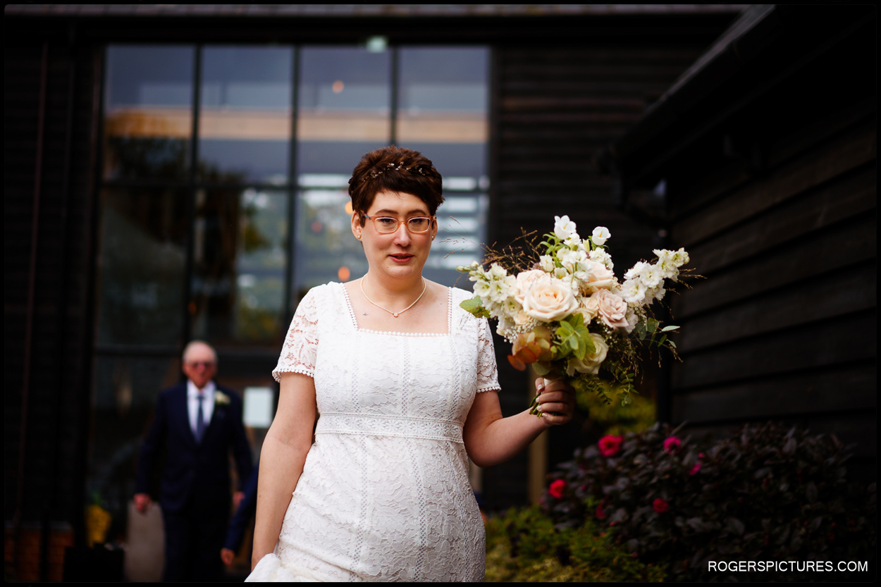 Bride arriving at Redcoats Farmhouse