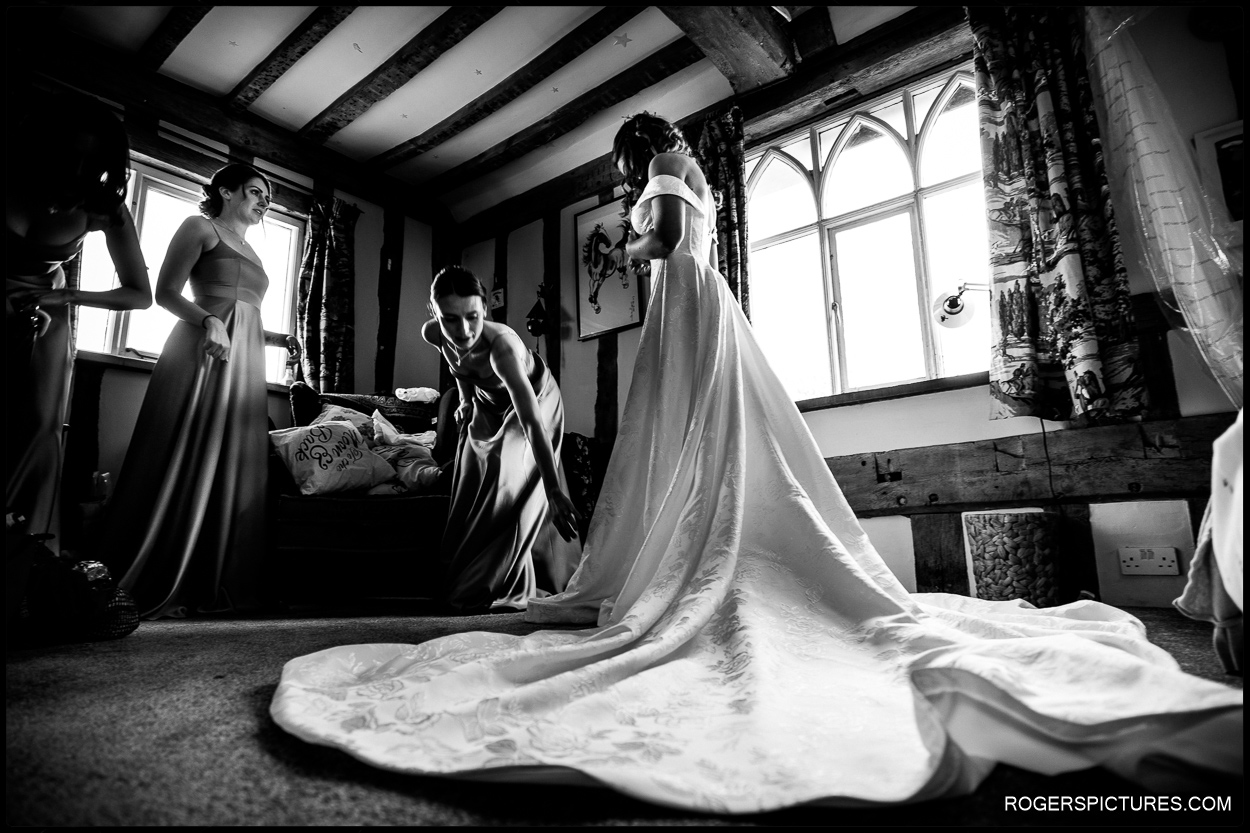 Documentary wedding photo of bride in wedding dress
