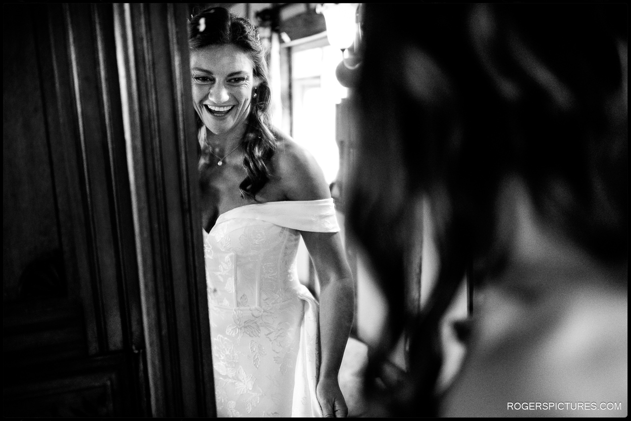 Black and white picture of bride getting ready