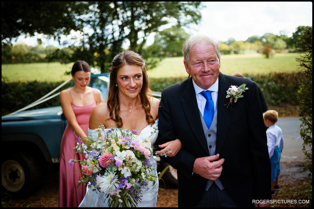 Bride and Father at church wedding in Norfolk
