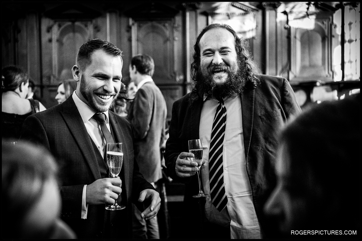 Guests at a wedding reception in the Bodleian libraries Oxford