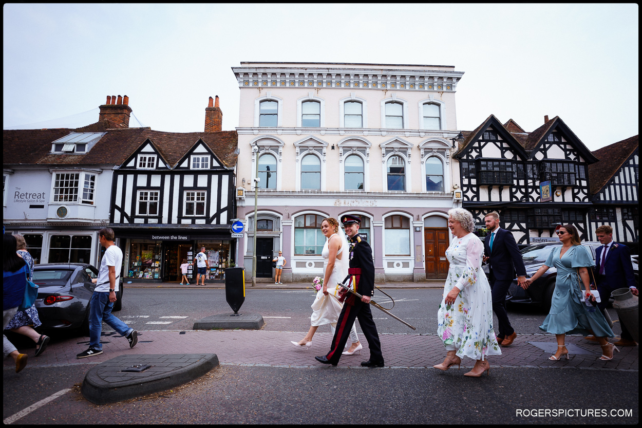 Newlywed couple walk through Farnham town centre