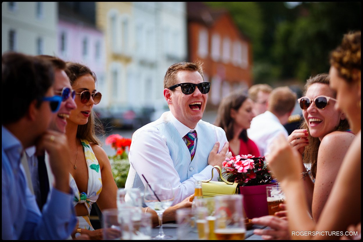 Wedding guests enjoying a drink in Farnham town centre