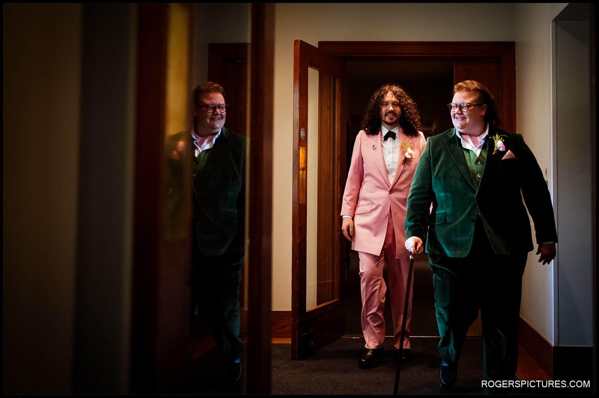 London Wedding at Town Hall Hotel – The grooms make a stylish entrance, one in a green velvet suit, the other in a pink tuxedo.