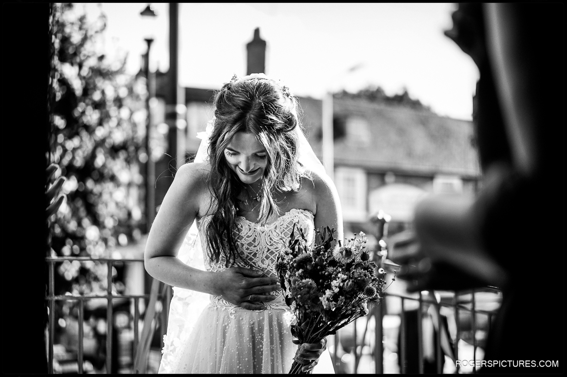Black and white photo of a nervous bride about to enter the church