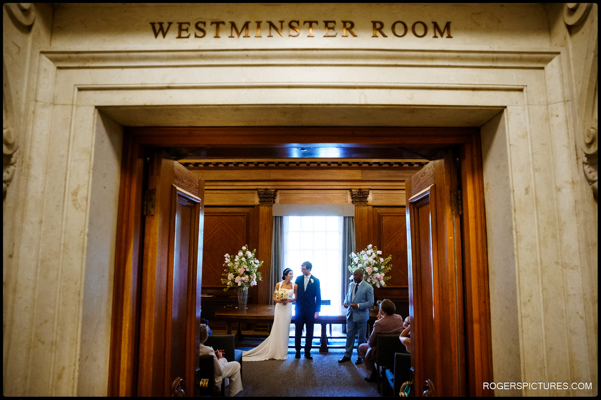 A view through the doorway of the Westminster Room during the ceremony at Marylebone Town Hall.