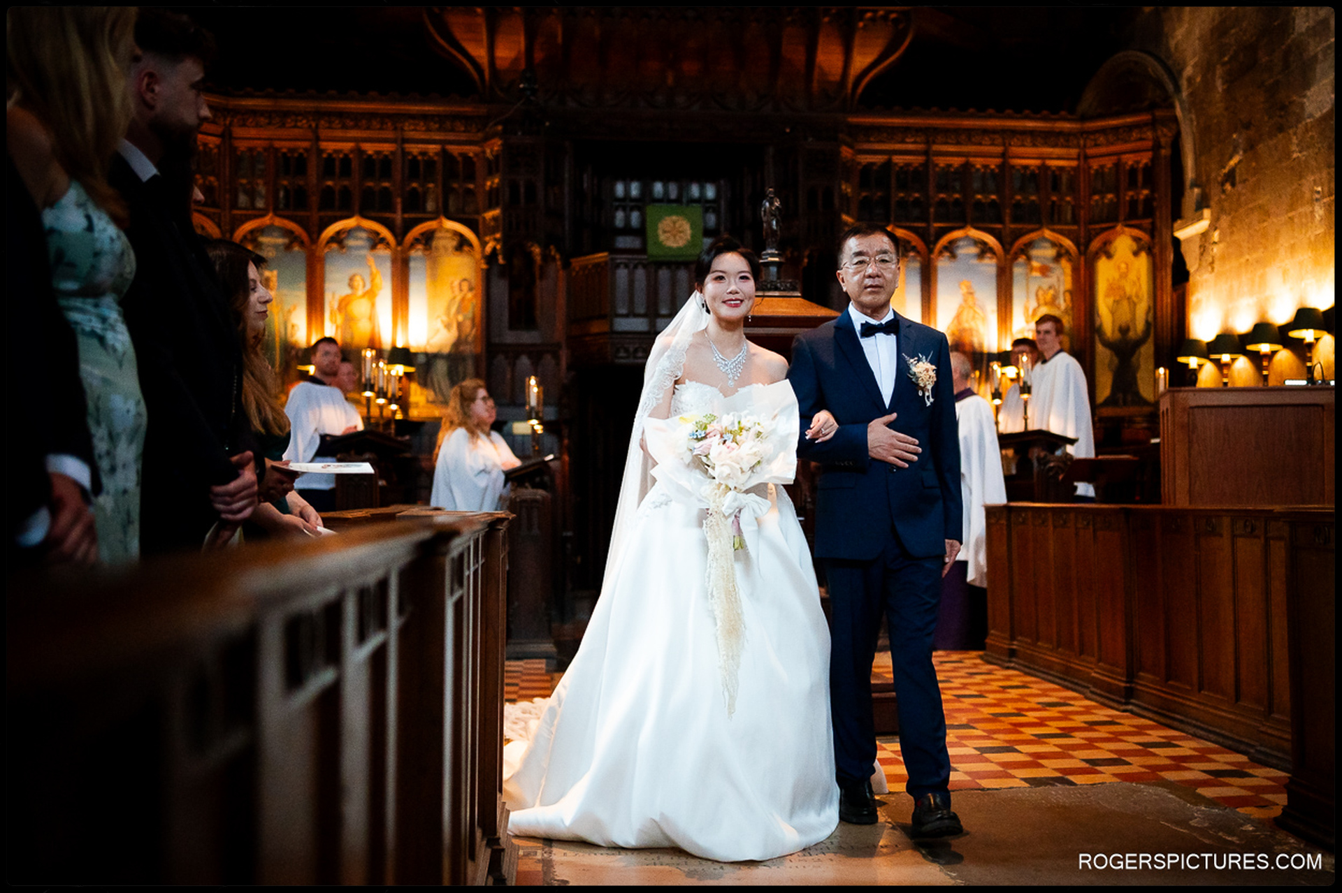 Bride walking down the aisle at St Bartholomew the Great with her father