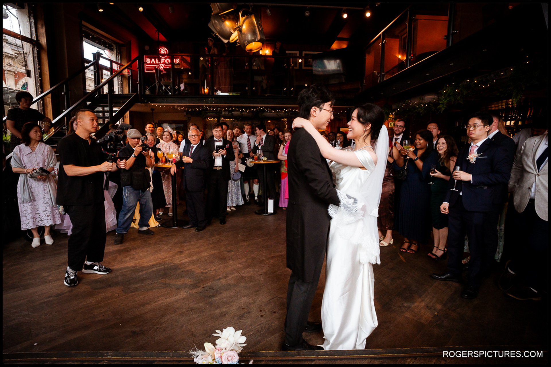 First dance at Balfour St Barts with guests gathered around