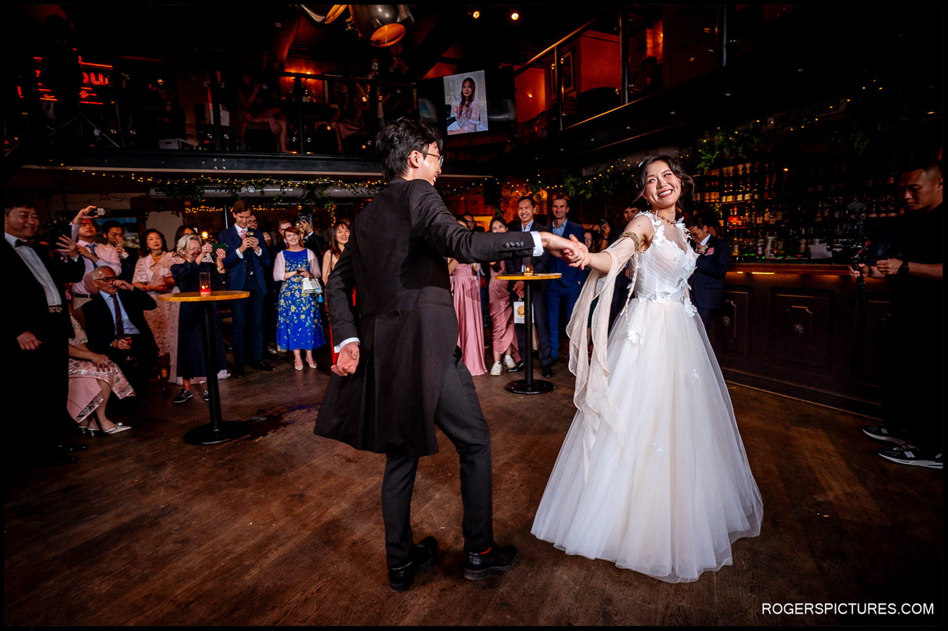 Couple dancing together during the evening reception at Balfour St Barts