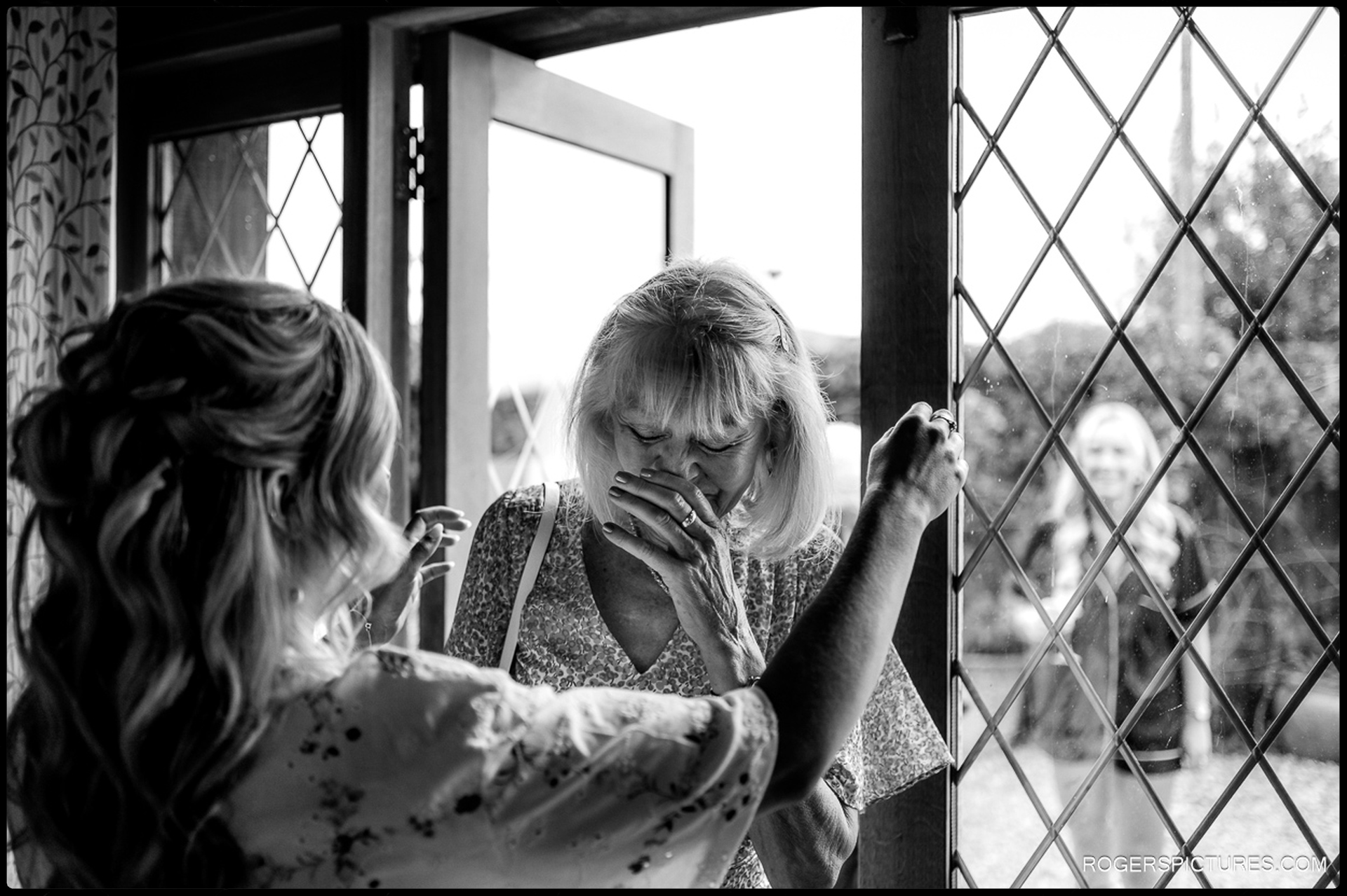 Emotional moment as the bride greets her mother at Rumbolds Farm on the wedding morning.